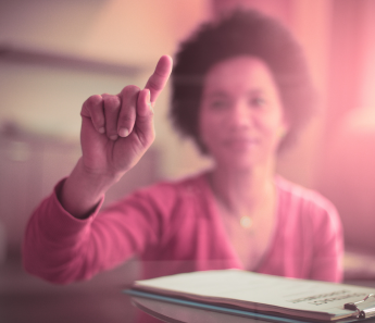 Woman holding her hand up